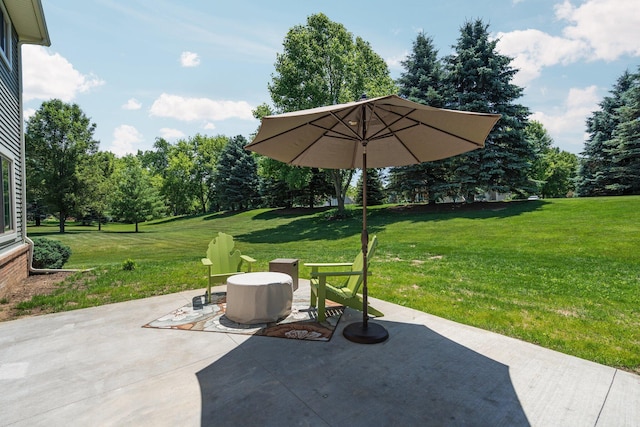 7662 Hidden Ponds Blvd, Brighton, MI 48114 - view of patio / terrace with view of wooded area