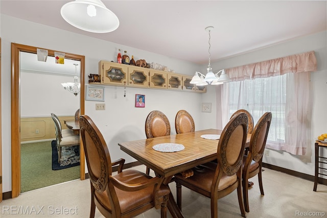 6088 Sierra Pass, Flint, MI 48532 - dining room featuring a chandelier and baseboards