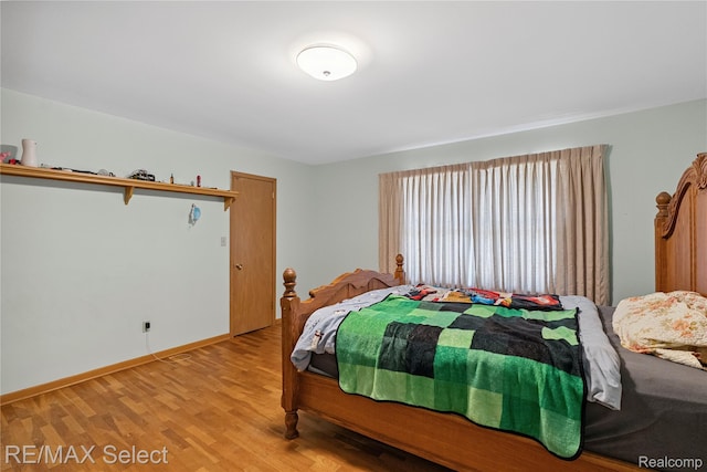 6088 Sierra Pass, Flint, MI 48532 - bedroom with light wood finished floors and baseboards