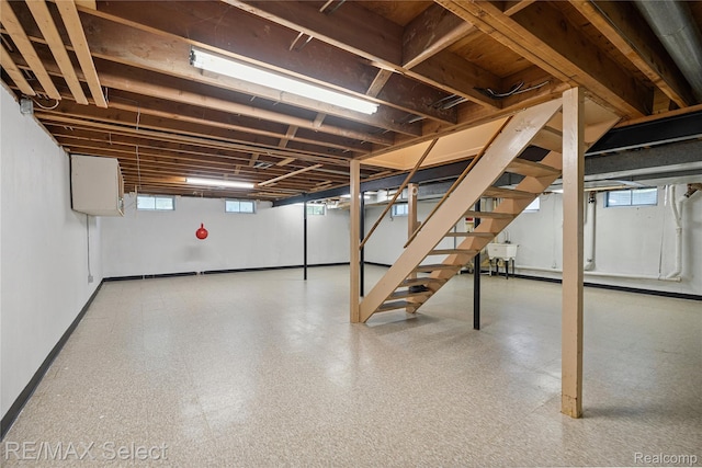 6088 Sierra Pass, Flint, MI 48532 - basement with stairway and a sink