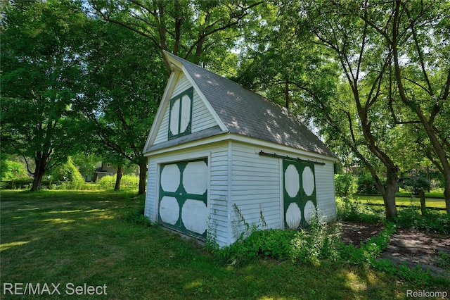 6088 Sierra Pass, Flint, MI 48532 - view of outdoor structure featuring view of wooded area