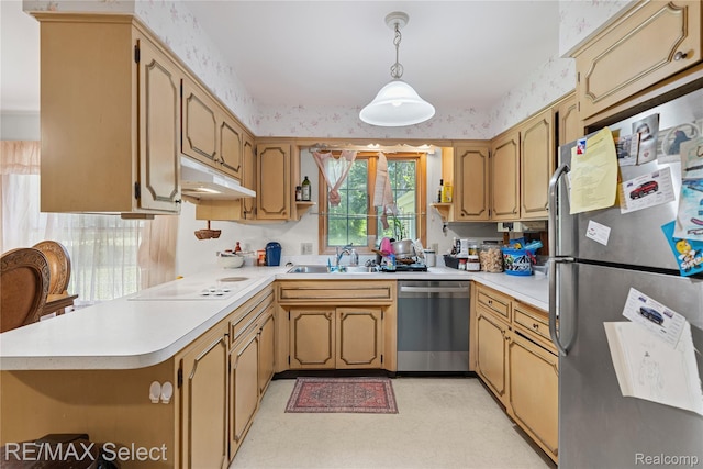 6088 Sierra Pass, Flint, MI 48532 - kitchen with appliances with stainless steel finishes, under cabinet range hood, a peninsula, light countertops, and decorative light fixtures