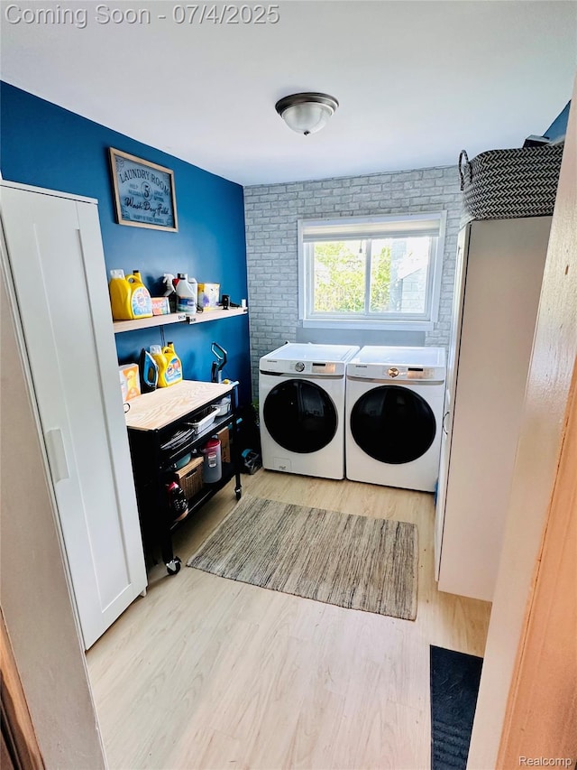 23360 Battelle Ave, Hazel Park, MI 48030 - laundry room featuring washing machine and clothes dryer and light wood-style floors