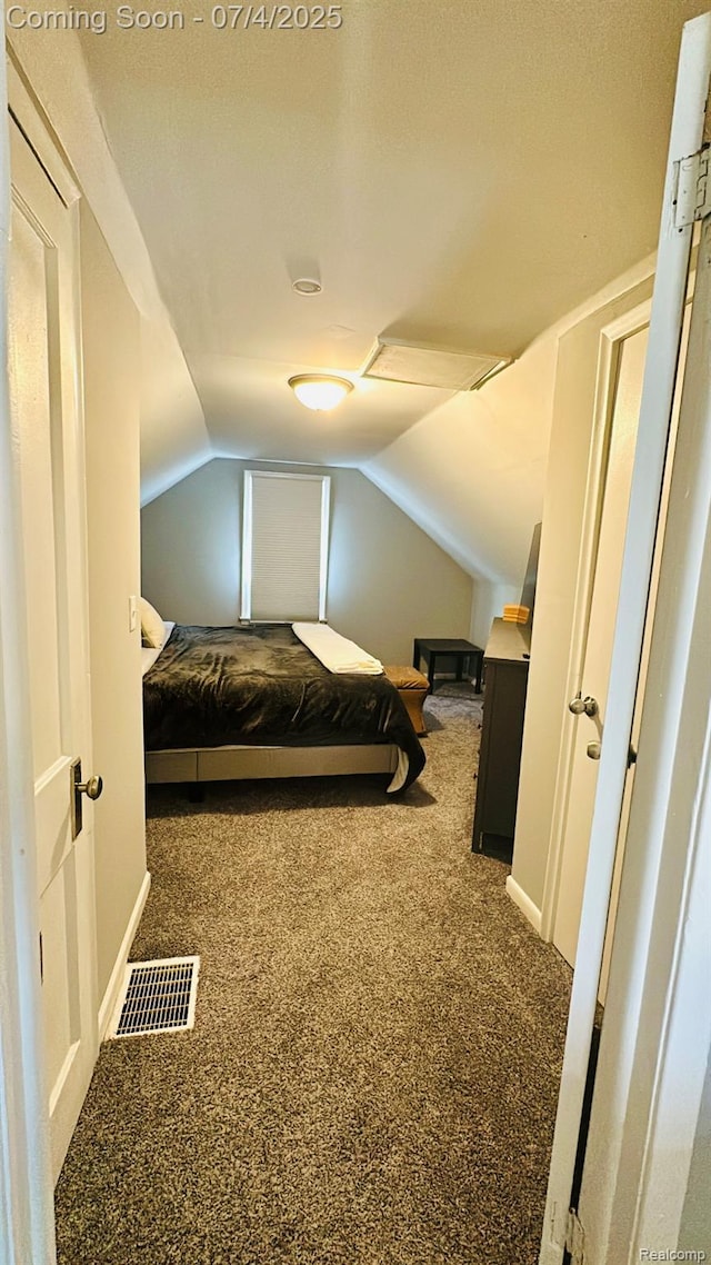 23360 Battelle Ave, Hazel Park, MI 48030 - carpeted bedroom with lofted ceiling and baseboards