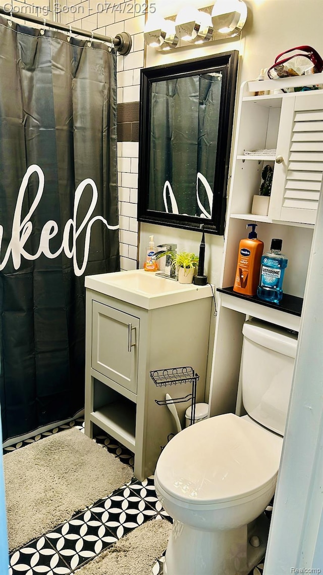 23360 Battelle Ave, Hazel Park, MI 48030 - bathroom featuring vanity and a shower with shower curtain