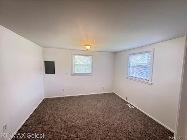 2017 Noble Ave, Flushing, MI 48532 - unfurnished room with electric panel and carpet