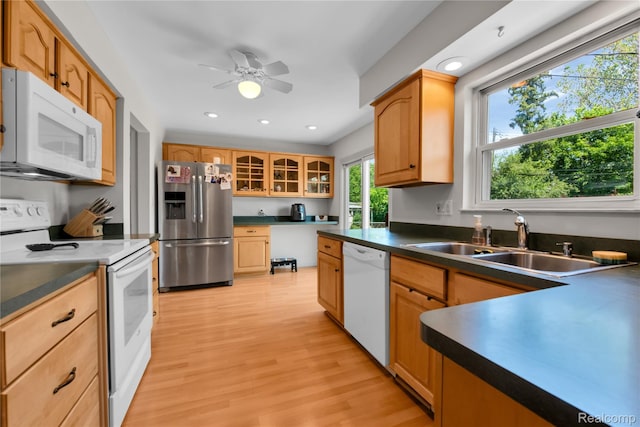 607 Ashburnham St, Auburn Hills, MI 48326 - kitchen featuring white appliances, dark countertops, light wood finished floors, recessed lighting, and glass insert cabinets