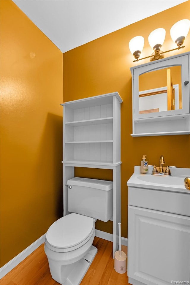 607 Ashburnham St, Auburn Hills, MI 48326 - half bathroom with wood finished floors and vanity