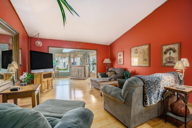 1721 Quail Run Dr, Kalamazoo, MI 49009 - living area with lofted ceiling and light wood-style floors