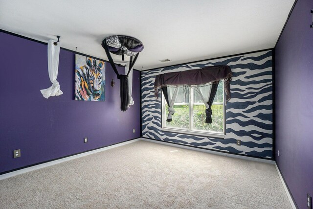 1721 Quail Run Dr, Kalamazoo, MI 49009 - empty room featuring carpet flooring and baseboards
