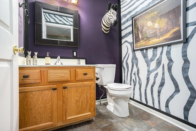 1721 Quail Run Dr, Kalamazoo, MI 49009 - bathroom featuring vanity and toilet