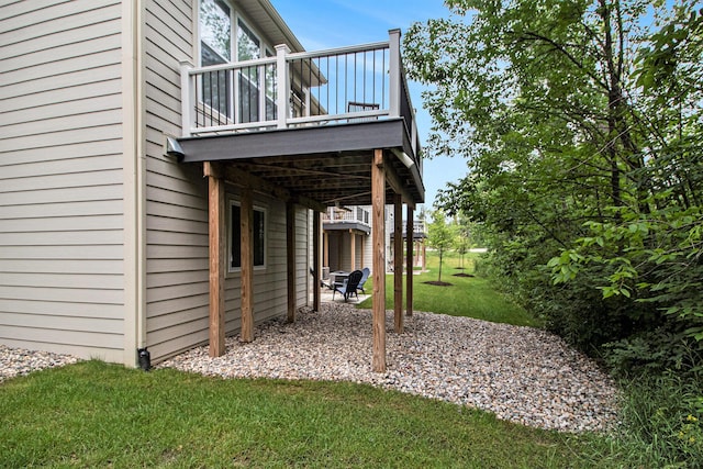 3306 Sunton Rd, Ann Arbor, MI 48105 - view of grassy yard with a patio and a wooden deck