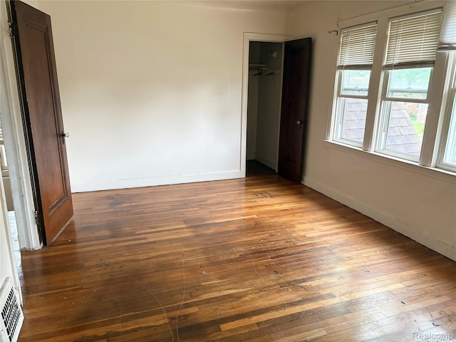 14892 Hubbell St, Detroit, MI 48227 - empty room featuring wood-type flooring and baseboards