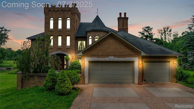9000 Ferry Rd, Grosse Ile, MI 48138 - view of front of property featuring driveway, brick siding, an attached garage, and a chimney