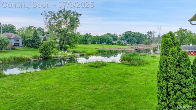 9000 Ferry Rd, Grosse Ile, MI 48138 - view of grassy yard featuring a water view