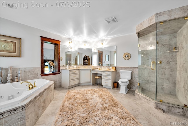 9000 Ferry Rd, Grosse Ile, MI 48138 - full bath with tile walls, a stall shower, a jetted tub, vanity, and a wainscoted wall