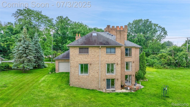 9000 Ferry Rd, Grosse Ile, MI 48138 - back of house featuring a chimney, a lawn, and brick siding
