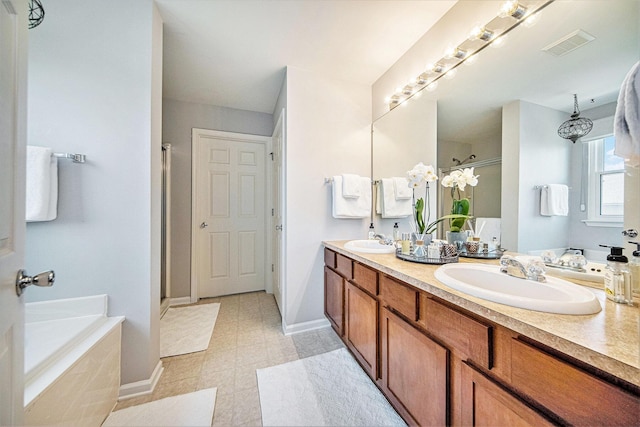 440 Shiloh Dr, Chelsea, MI 48118 - full bath with a shower stall, double vanity, and a bath