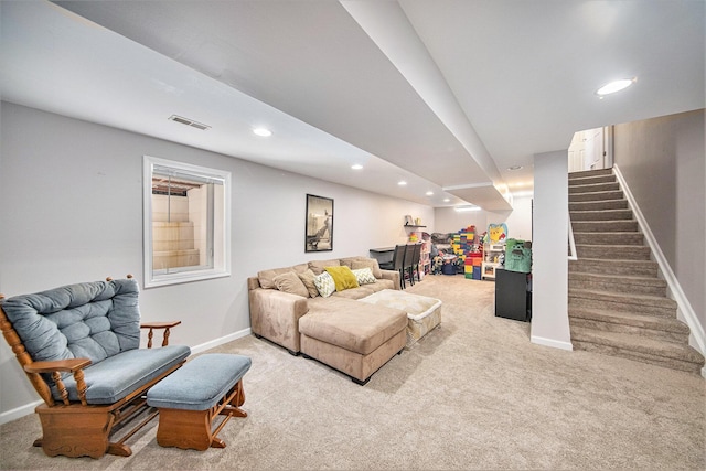 440 Shiloh Dr, Chelsea, MI 48118 - living area featuring light carpet, recessed lighting, and stairs