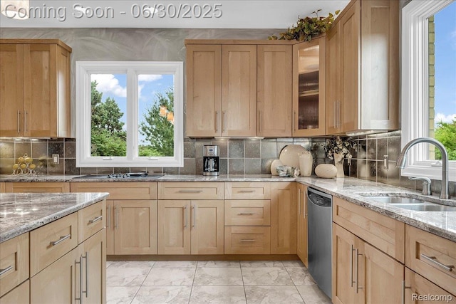 550 Kings Fairway Ct, Grand Blanc, MI 48439 - kitchen with stainless steel dishwasher, light marble finish floors, light brown cabinets, and light stone counters