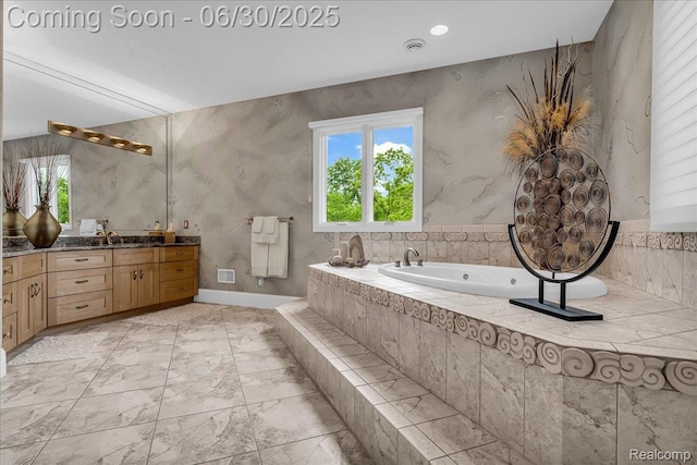 550 Kings Fairway Ct, Grand Blanc, MI 48439 - bathroom with vanity, a tub with jets, and marble finish flooring