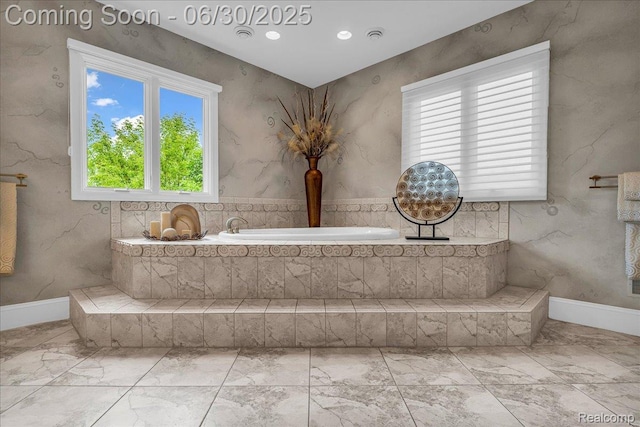 550 Kings Fairway Ct, Grand Blanc, MI 48439 - full bath featuring marble finish flooring, plenty of natural light, and tiled tub
