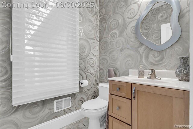 550 Kings Fairway Ct, Grand Blanc, MI 48439 - bathroom with wallpapered walls, vanity, and tile patterned flooring