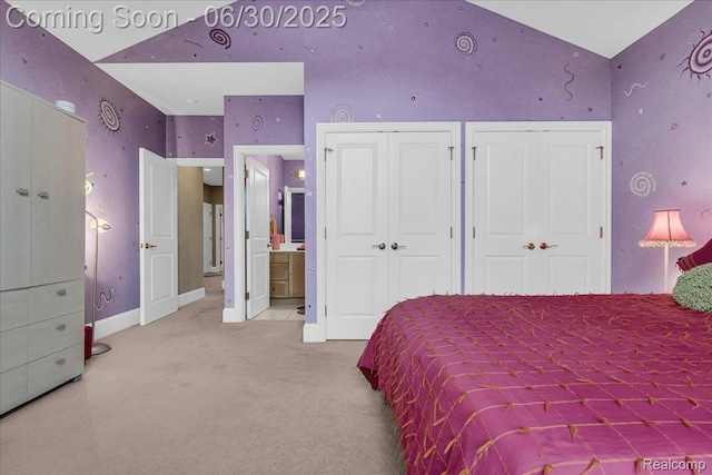 550 Kings Fairway Ct, Grand Blanc, MI 48439 - carpeted bedroom featuring two closets, high vaulted ceiling, and ensuite bathroom