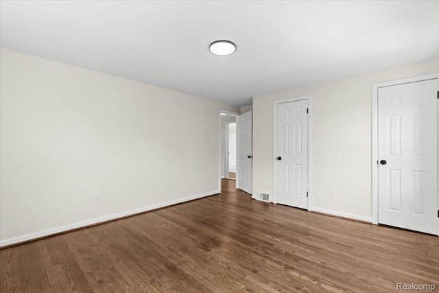 18639 Kentucky St, Detroit, MI 48221 - unfurnished bedroom featuring wood finished floors and baseboards
