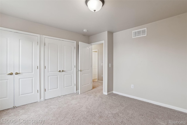 2450 Hewitt St, Hamtramck, MI 48212 - unfurnished bedroom with carpet and baseboards