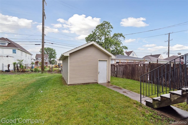 2450 Hewitt St, Hamtramck, MI 48212 - fenced backyard featuring a shed