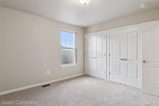 2450 Hewitt St, Hamtramck, MI 48212 - unfurnished bedroom with carpet and baseboards
