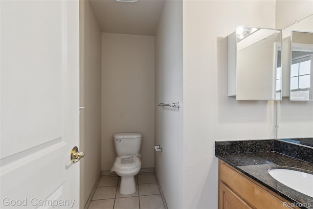 2450 Hewitt St, Hamtramck, MI 48212 - bathroom with vanity and tile patterned flooring