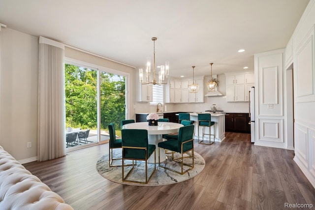 1957 Emerald Ln, Wixom, MI 48393 - dining room with a chandelier, recessed lighting, and dark wood-style flooring