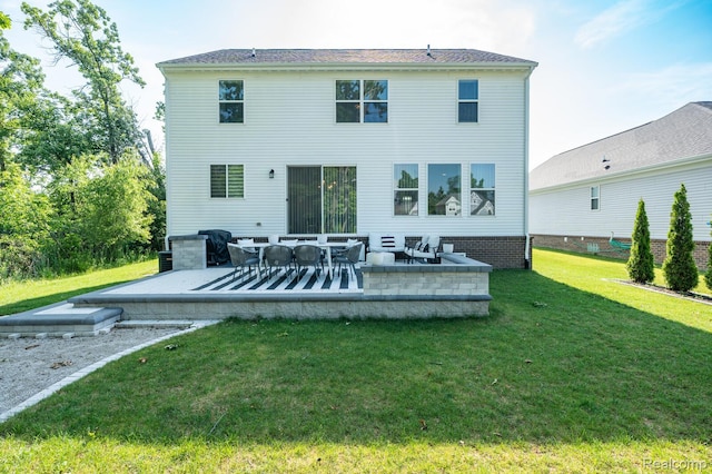 1957 Emerald Ln, Wixom, MI 48393 - back of property featuring a yard and a patio