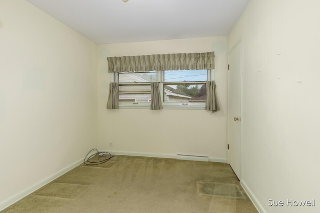 1547 Edith Ave NE, Grand Rapids, MI 49505 - carpeted spare room featuring baseboards