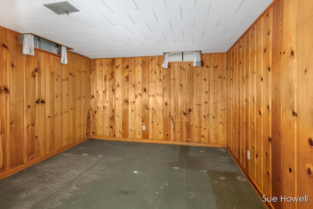 1547 Edith Ave NE, Grand Rapids, MI 49505 - below grade area featuring baseboards and wood walls