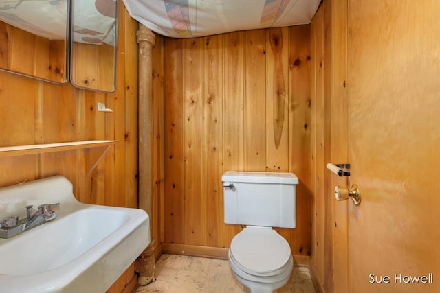 1547 Edith Ave NE, Grand Rapids, MI 49505 - half bathroom with wood walls