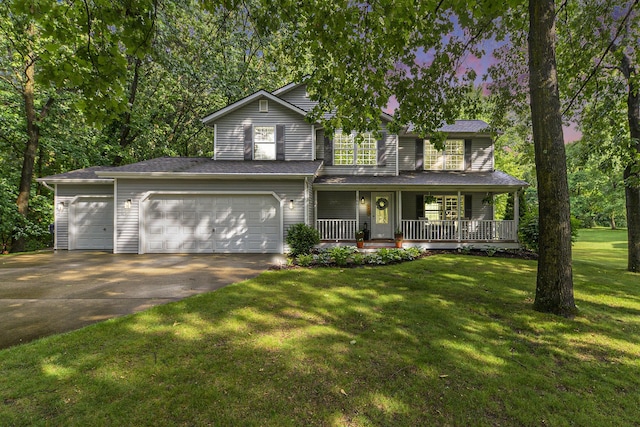 8601 Hathaway Rd, Kalamazoo, MI 49009 - traditional-style house featuring concrete driveway, covered porch, a front lawn, and a garage