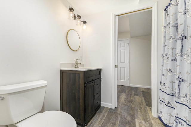 8601 Hathaway Rd, Kalamazoo, MI 49009 - full bath with vanity and wood finished floors