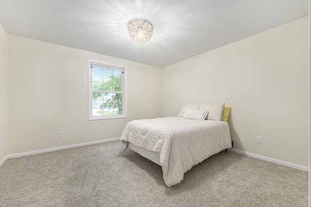 8601 Hathaway Rd, Kalamazoo, MI 49009 - bedroom featuring light colored carpet and baseboards