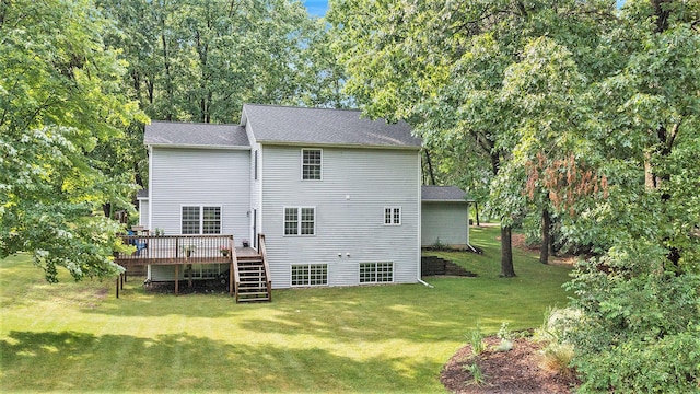 8601 Hathaway Rd, Kalamazoo, MI 49009 - rear view of house with a wooden deck, a lawn, stairway, and view of scattered trees