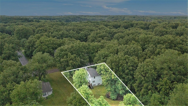 8601 Hathaway Rd, Kalamazoo, MI 49009 - aerial overview of property's location with a heavily wooded area and property boundaries highlighted