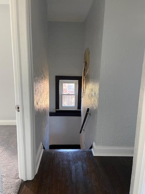 14402 Southfield Rd, Detroit, MI 48223 - staircase featuring baseboards
