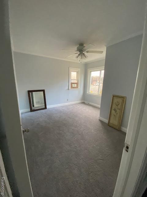 14402 Southfield Rd, Detroit, MI 48223 - unfurnished room with carpet flooring and ceiling fan