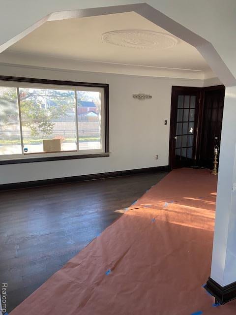 14402 Southfield Rd, Detroit, MI 48223 - empty room featuring wood finished floors and baseboards