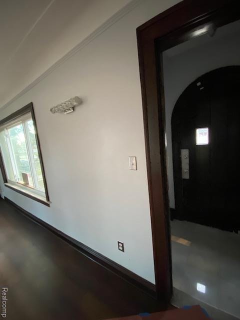 14402 Southfield Rd, Detroit, MI 48223 - unfurnished room featuring arched walkways and plenty of natural light