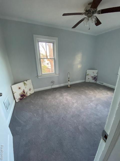 14402 Southfield Rd, Detroit, MI 48223 - spare room with carpet floors, crown molding, and a ceiling fan