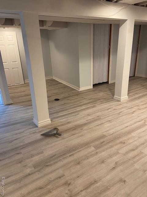 14402 Southfield Rd, Detroit, MI 48223 - finished below grade area with baseboards and light wood-type flooring