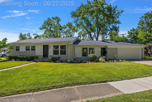 4550 Justine St, Shelby Twp, MI 48317 - single story home with brick siding, a garage, and a chimney